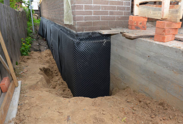 Happy homeowners after waterproofing job in Hoffman Estates
